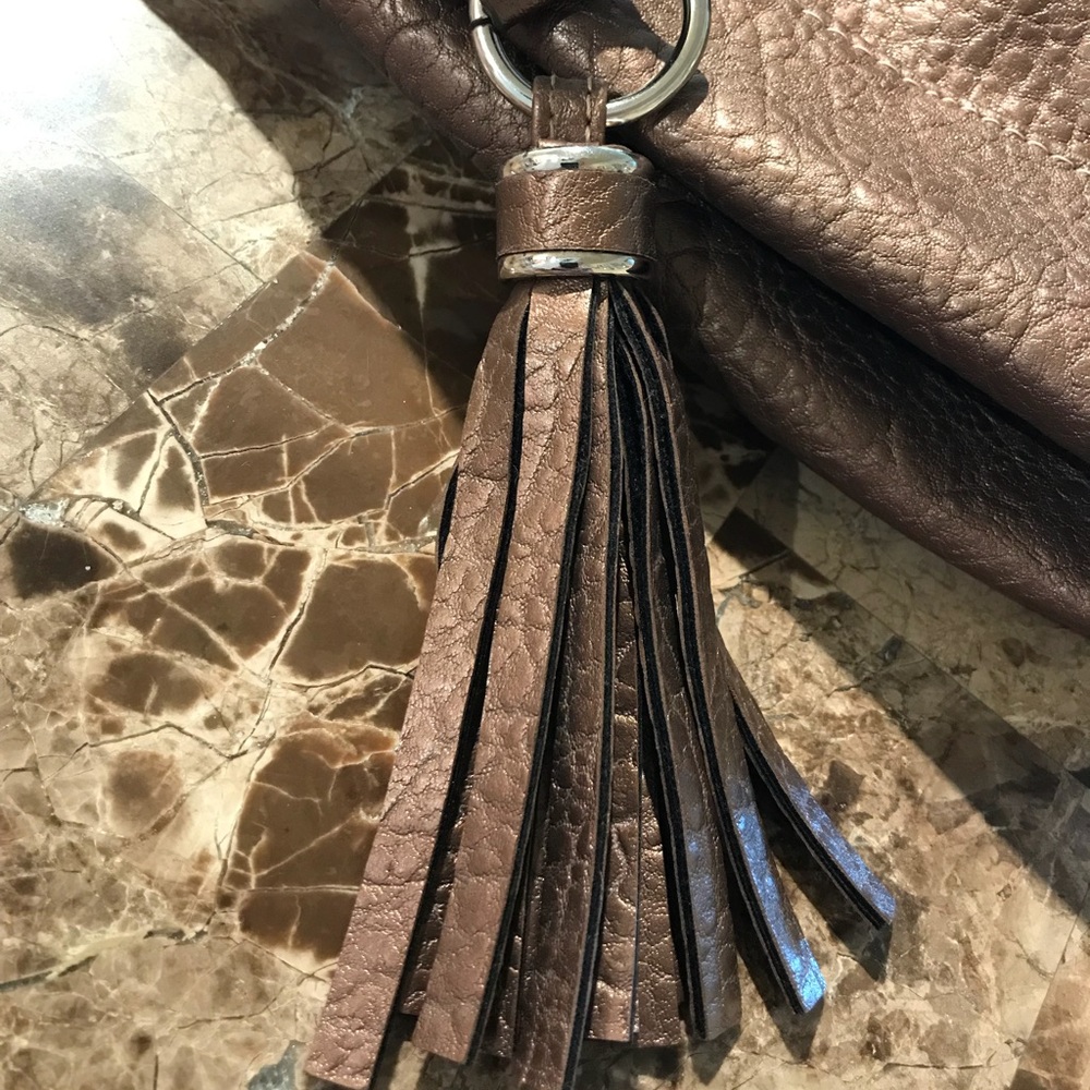 Metallic bronze bag